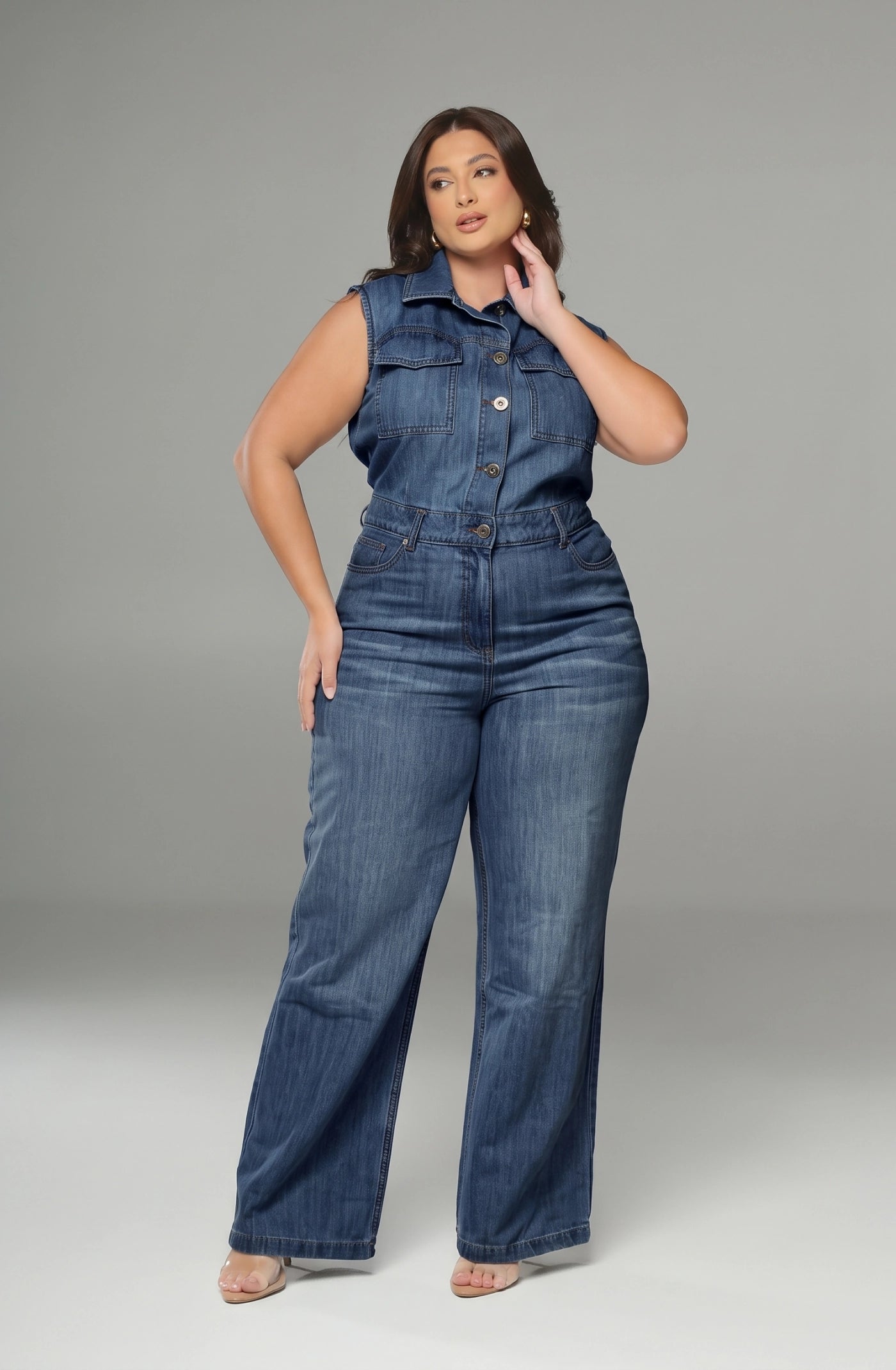 Macacão Jeans Plus Size Cintura Alta Marcada Azul Médio